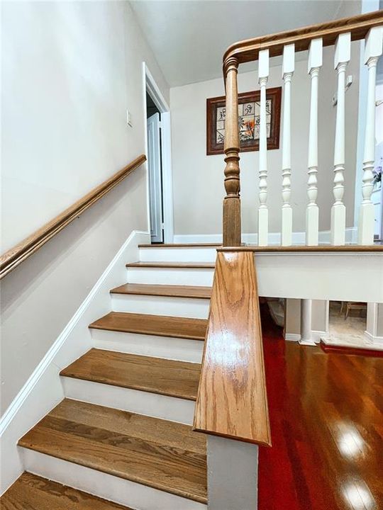 Stairs leading to 6 bedrooms upstairs