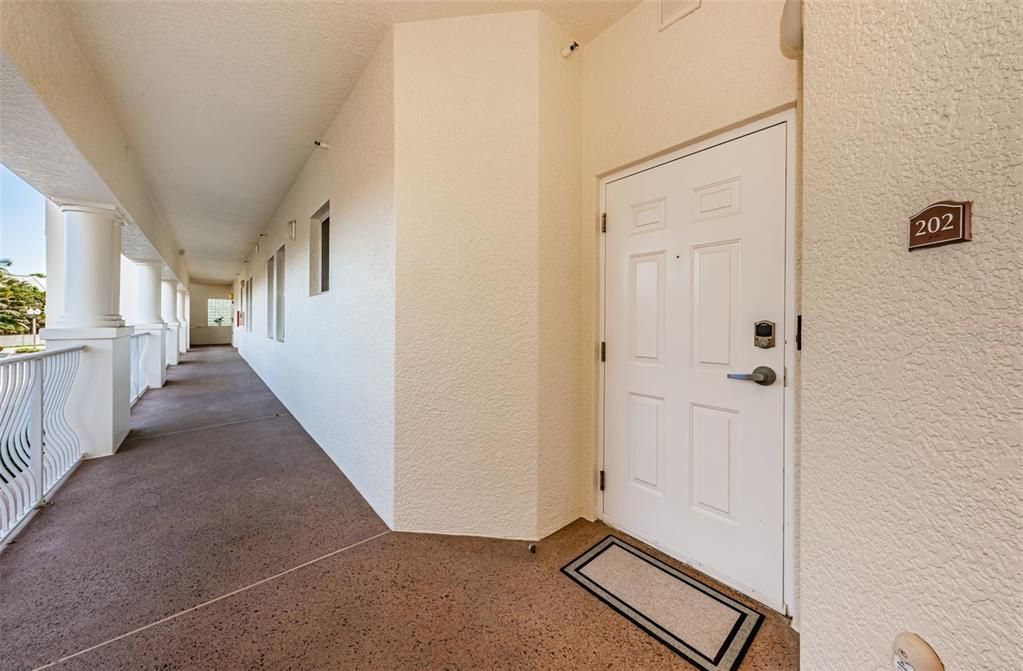 ... Front Walkway By La Bahia Unit # 202 ... Stairs on Both Ends of Walkway.. Elevator in the Middle.. Your Choice..