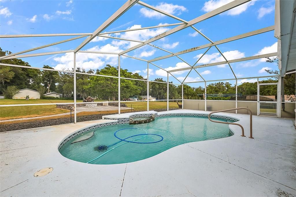 Fabulous pool, with cozy firepit just outside the screen enclosure.