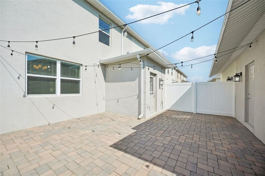 FENCED PAVER PATIO.