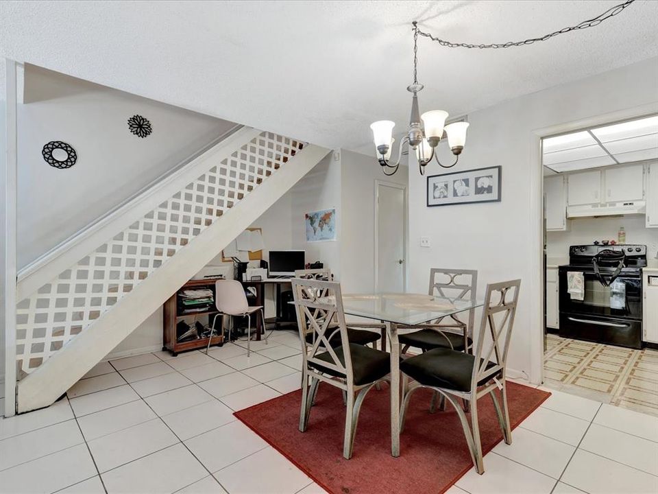 dining room, plus multiuse area under stairs for storage or desk space