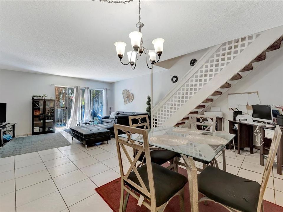 dining room/living room combo, plus multiuse area under stairs for storage or desk space