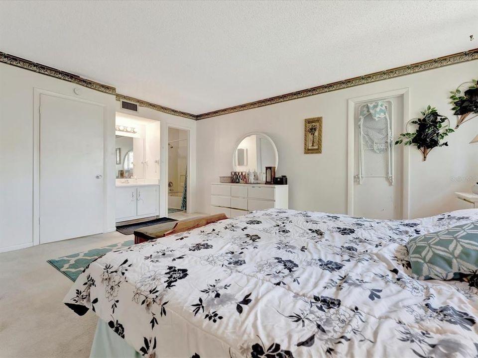 primary bedroom with separate vanity