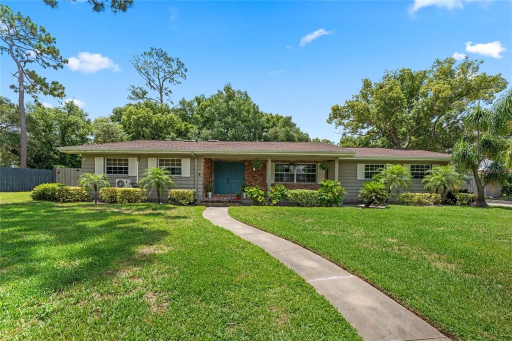 Front View with Sidewalk Leading to Front Door & Porch