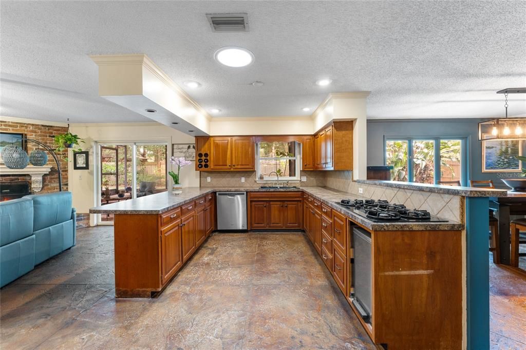 Spacious Kitchen with Breakfast Bar.  Not appearing in photo is Wet Bar area with Stainless Steel Refrigerator.