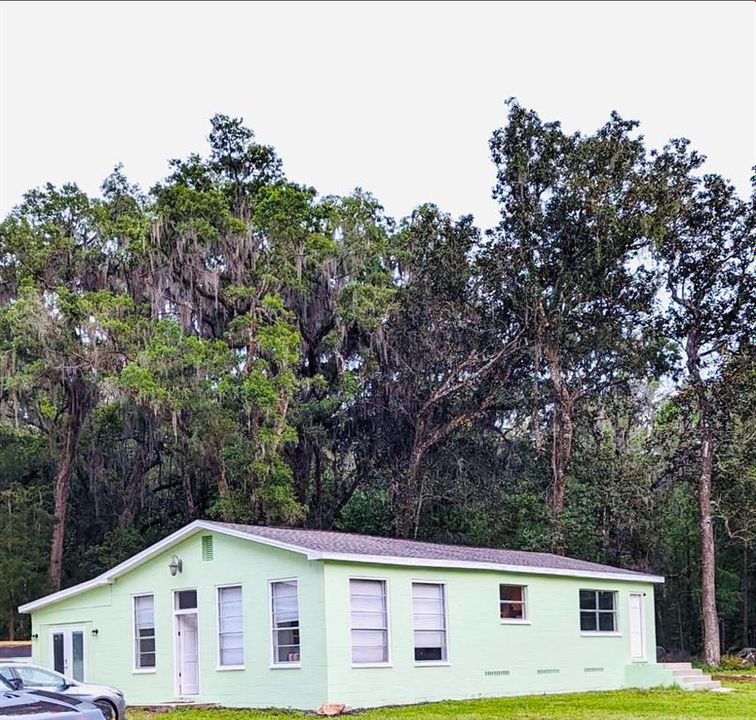 Look at this one story cement block home located just 1 hour North of Tampa.