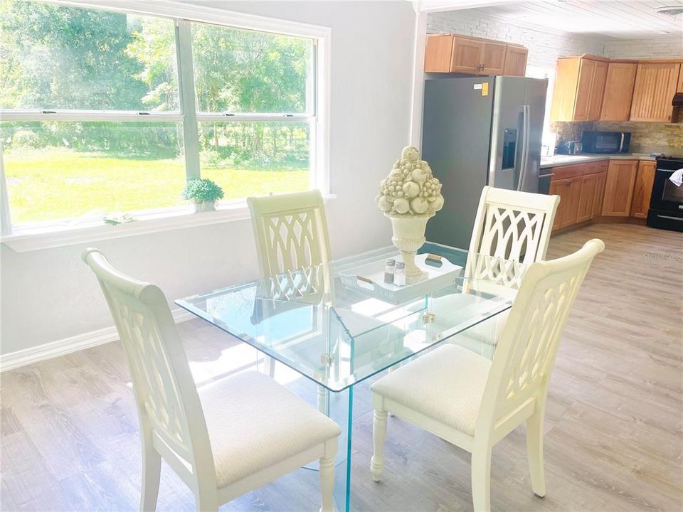 Dining Area has a gorgeous natural view of the serene surroundings