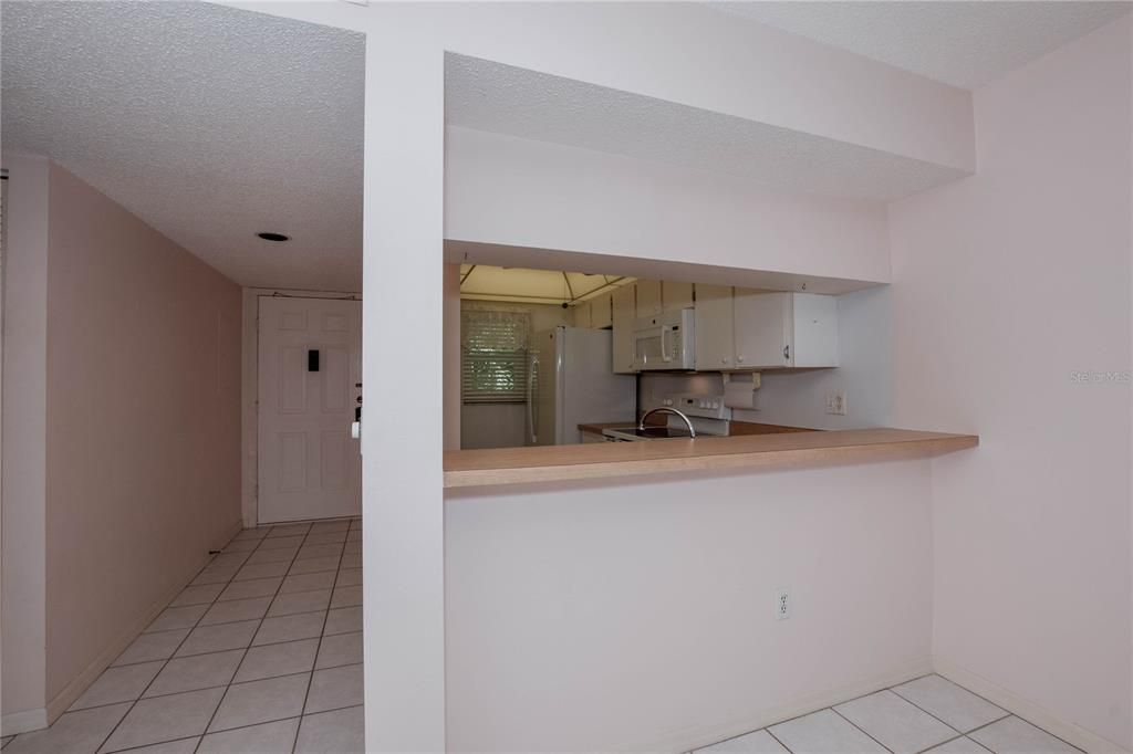 Foyer, kitchen, breakfast bar