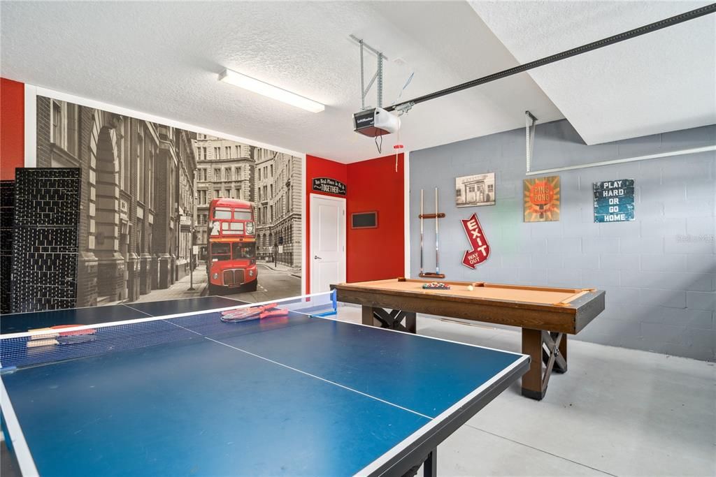 GAME ROOM WITH POOL TABLE IN GARAGE