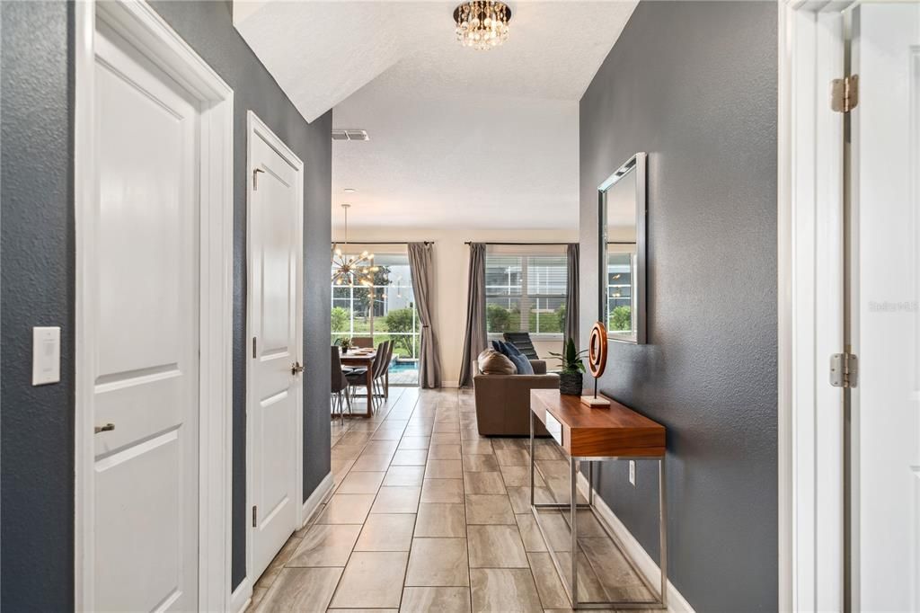 FOYER LEADING TO OPEN FLOOR PLAN