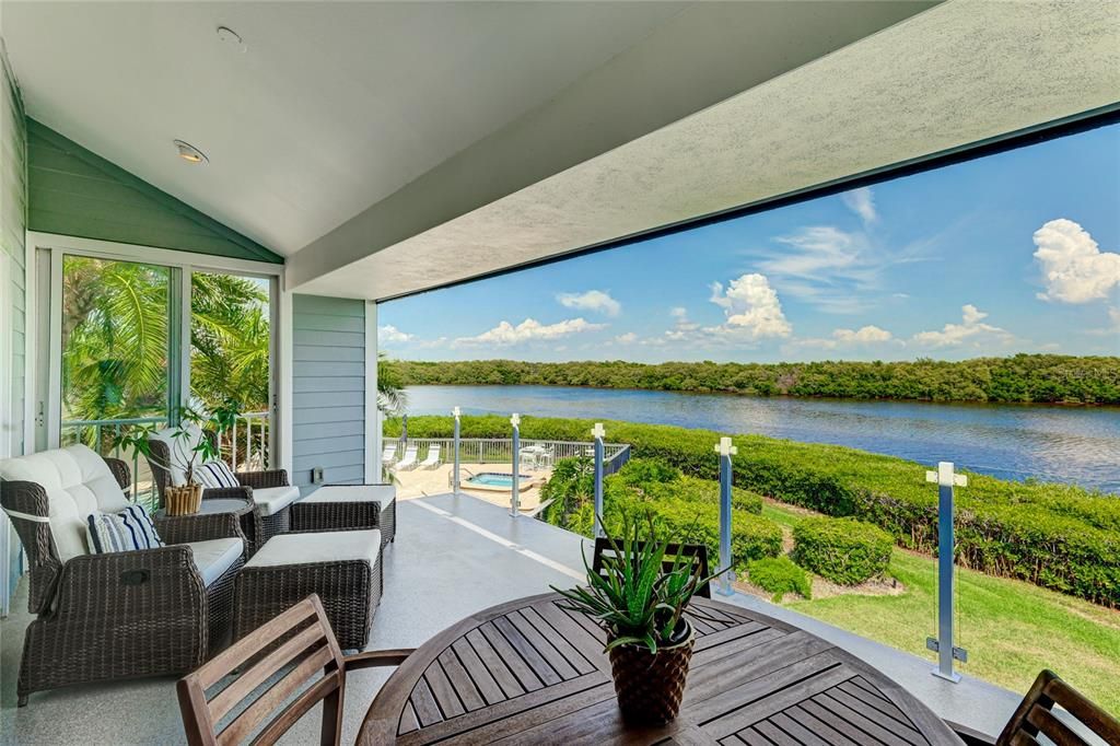 Views across the poolside lagoon and Sarasota Bay can be enjoyed from the covered deck on the second level.