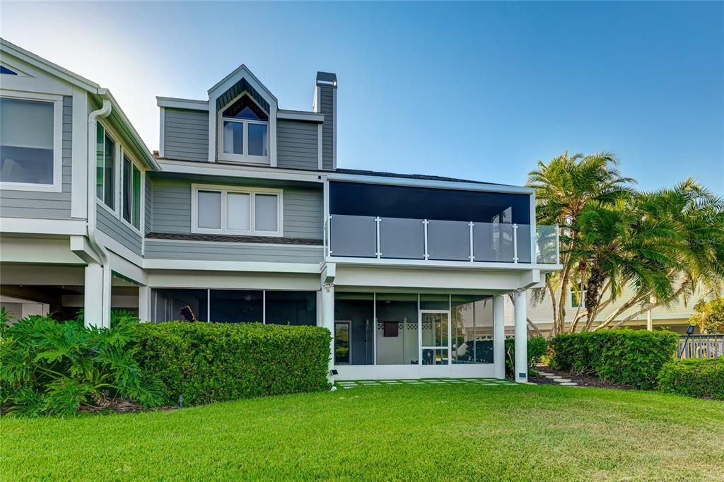 An island house with southern facing water views from 3 levels.