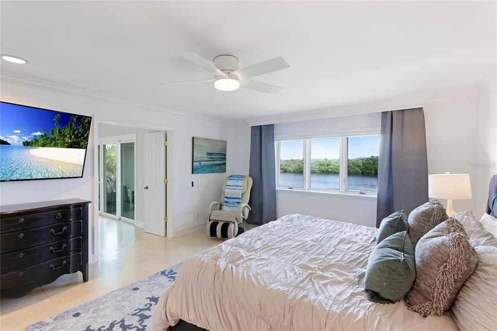Awaken to the sights and sounds of nature just outside of your bay front window.