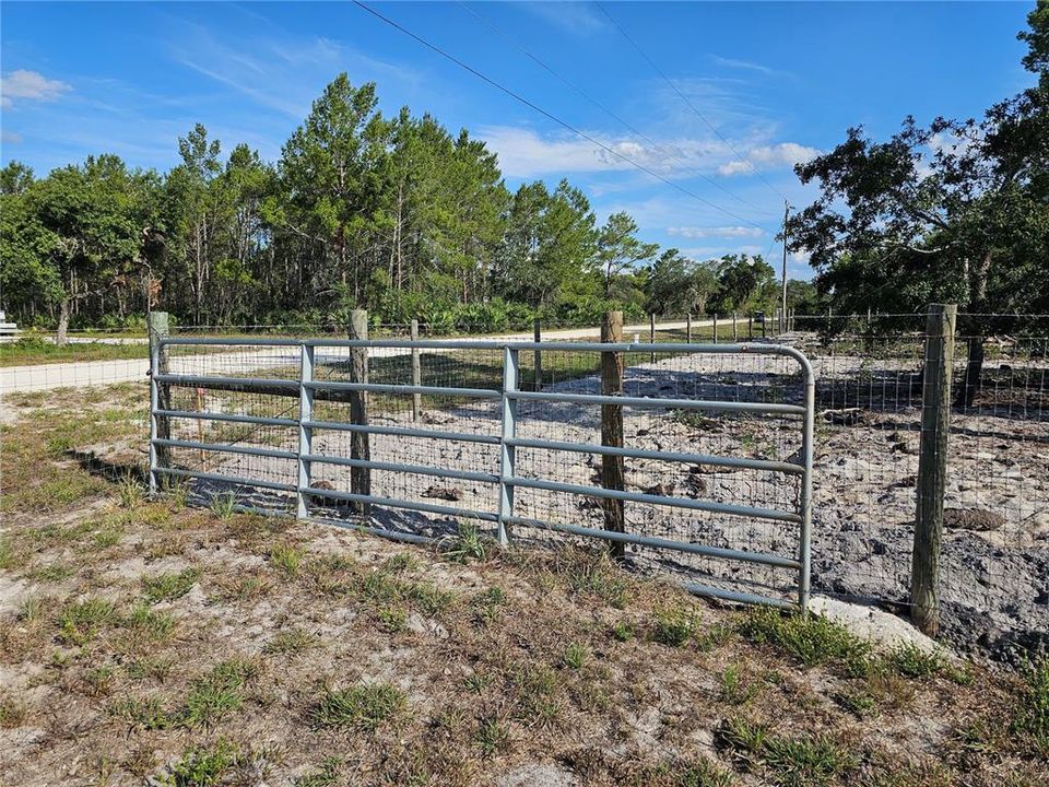 Gate is available next door for the new owner to decide where to put it.