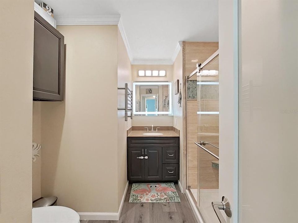 Bathroom 2. Completely updated! Step-in shower with glass doors.