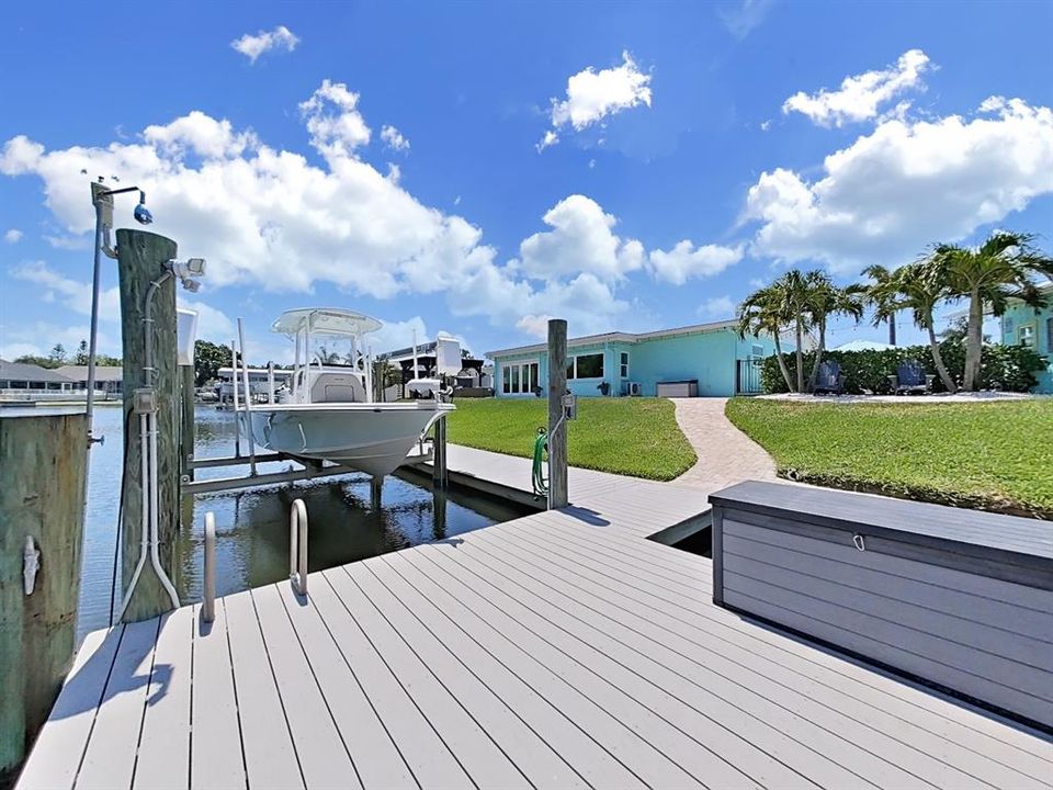 Plenty of room for docking at your Dock (durable composite wood) with 10,000lb Boat Lift, electric and water.