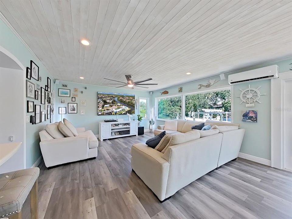 Great Room living area with water views through PictureFrame Windows!