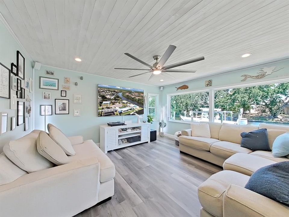 Water Views for DAYS from your Great Room!  62" ceiling fan for comfort. Detailed plank ceiling add to the elegant coastal vibe!