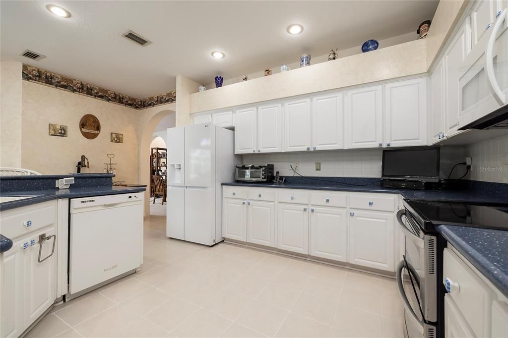 Kitchen with Corian counters and new appliances