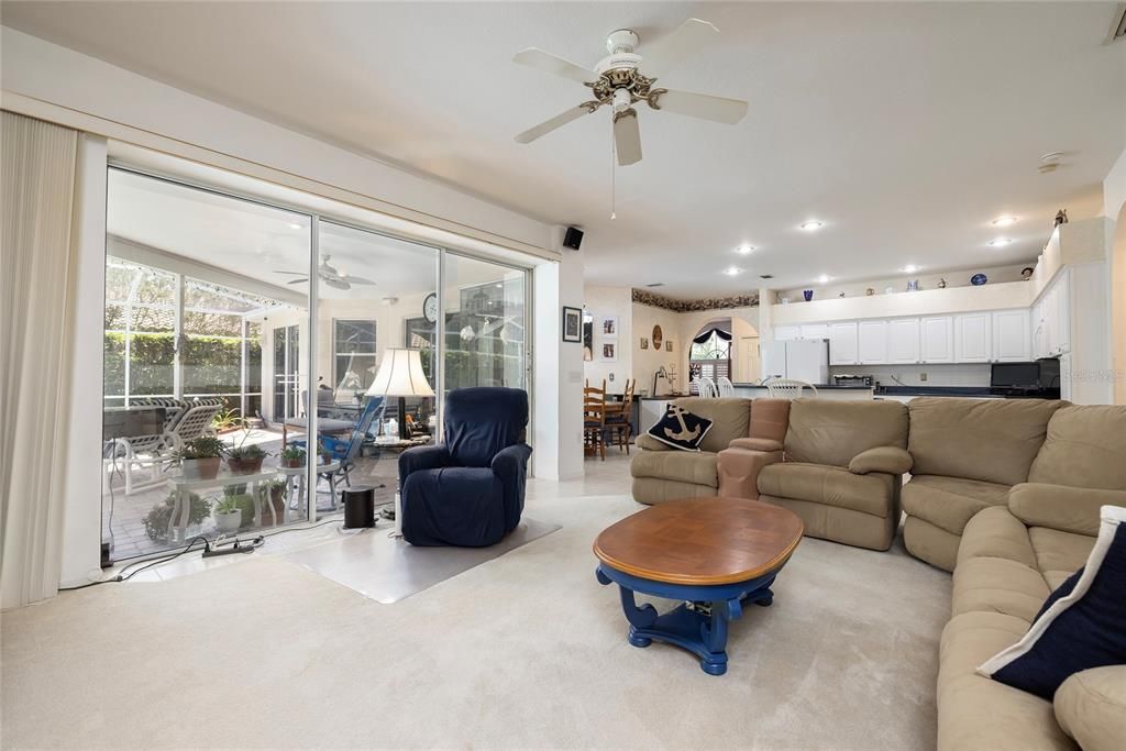 Family room with large sliders to the pool area