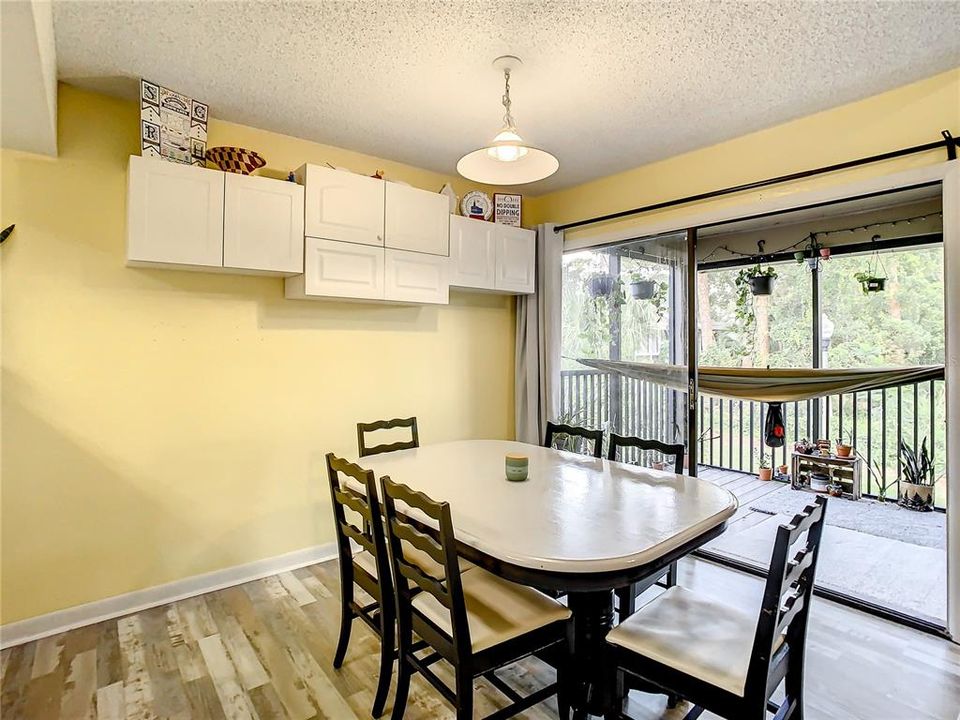 Nice size dining area with extra storage overlooking the patio