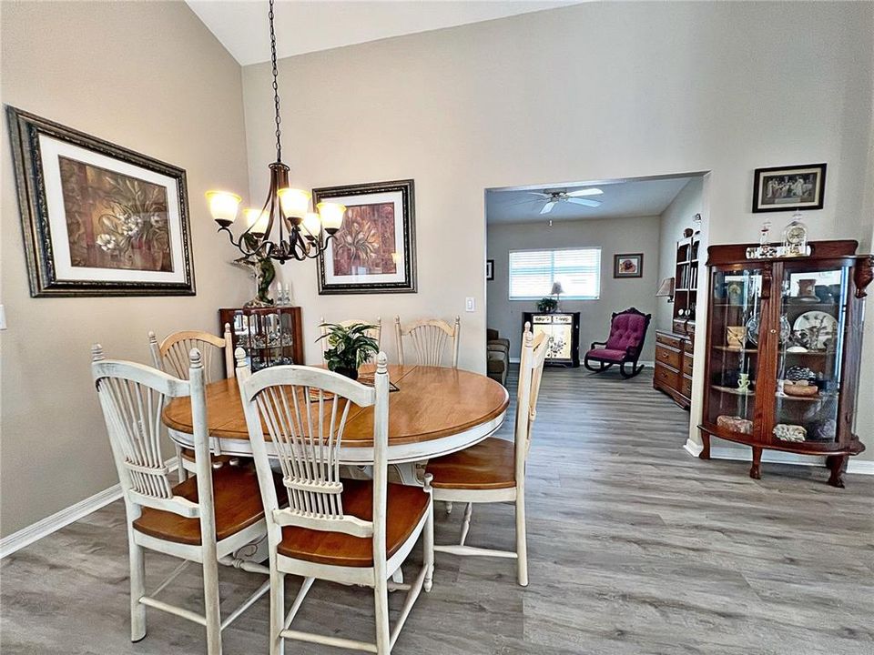 Additional view from living room of dining room and front entry