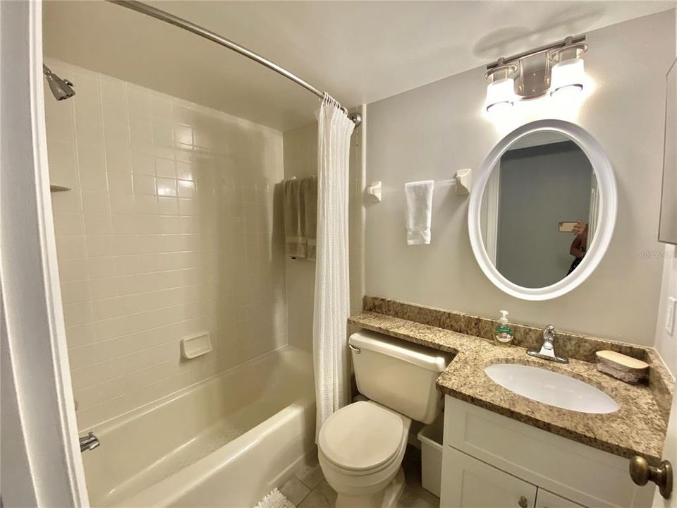 guest bathroom with tub/shower