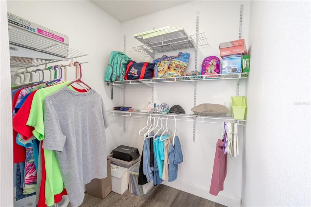 One of two walk-in closets.