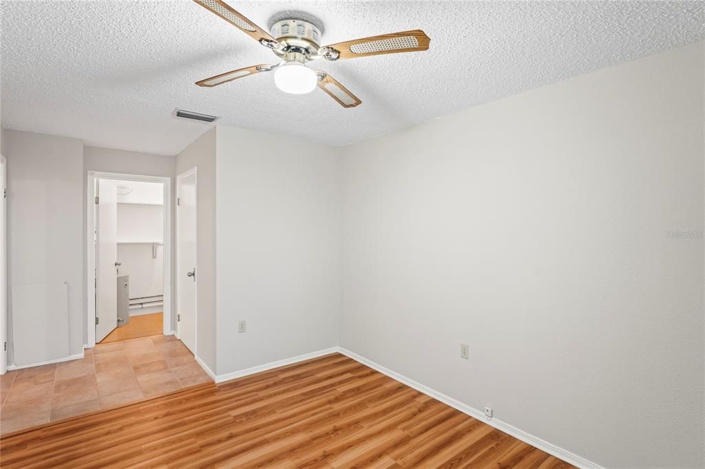 View of the hallway and utility room.