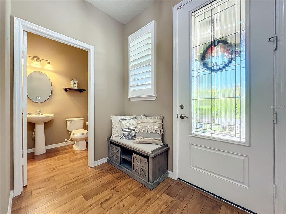 Foyer with downstairs powder room