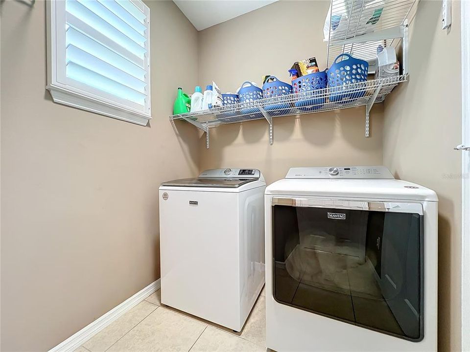 Laundry room with plumbing to add a laundry sink