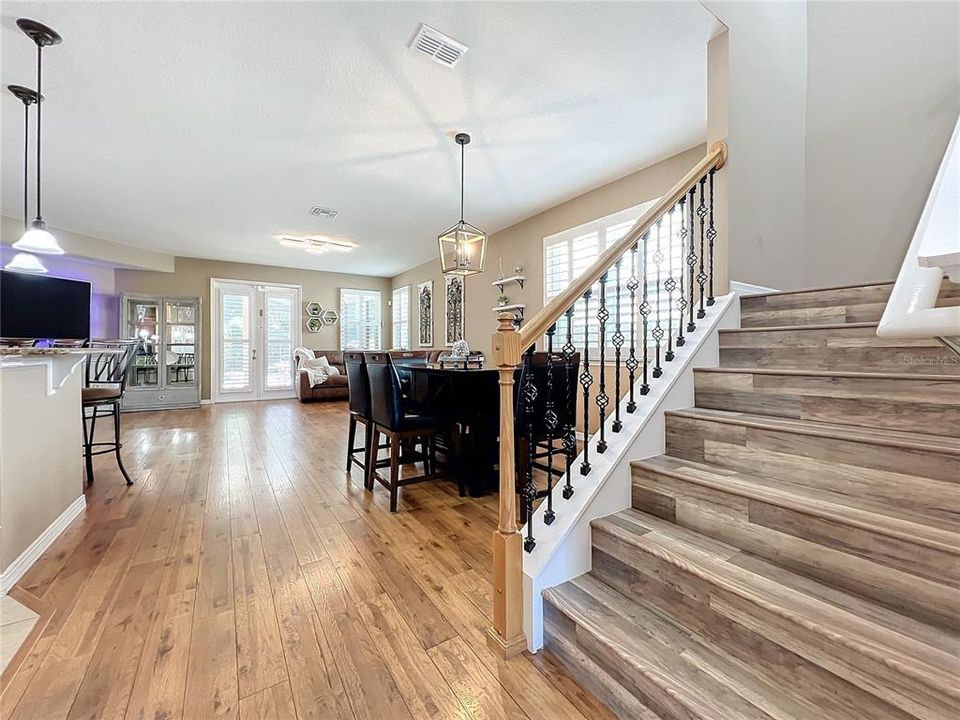 Front Entry looking toward the open concept Living room, dining room and kitchen.