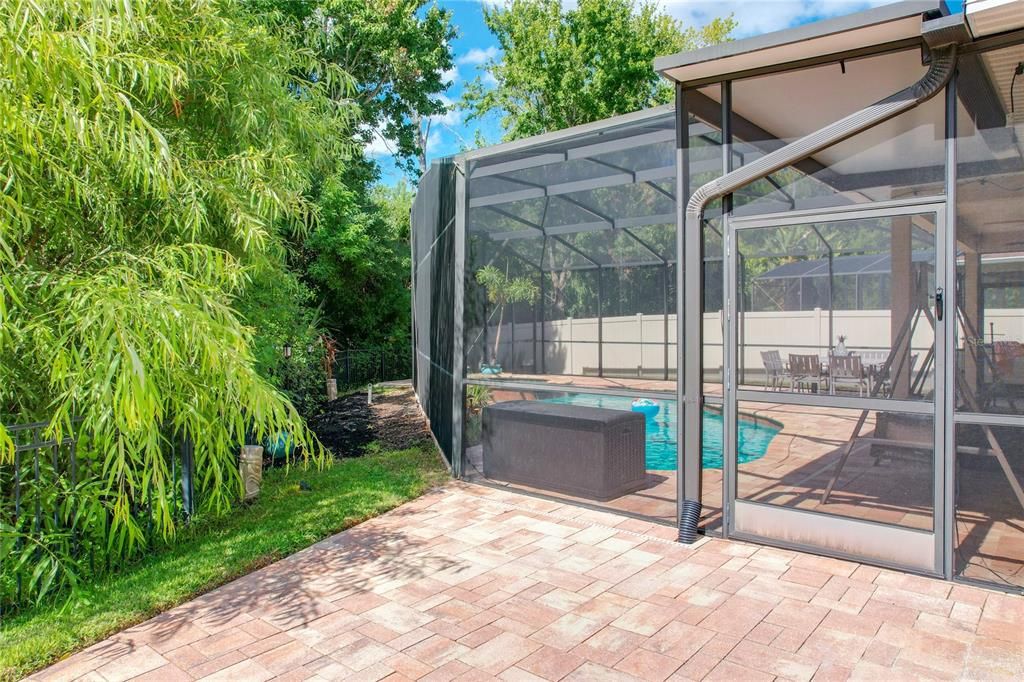 Side Patio overlooking pool and conservation area