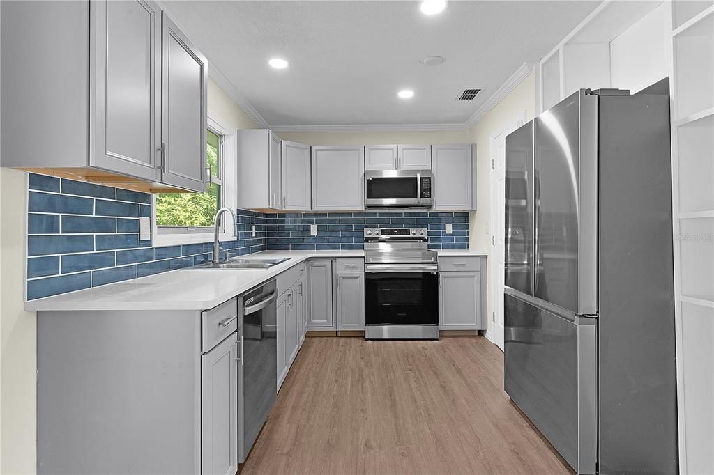 Gorgeous kitchen with brand new appliances.