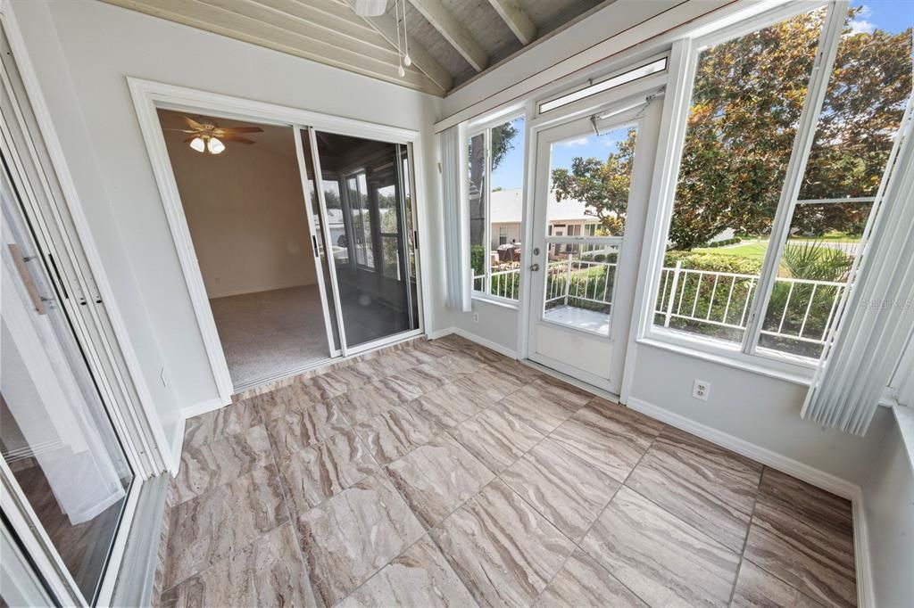 2nd suite leads out to the sunroom and terrace! I would take this room!