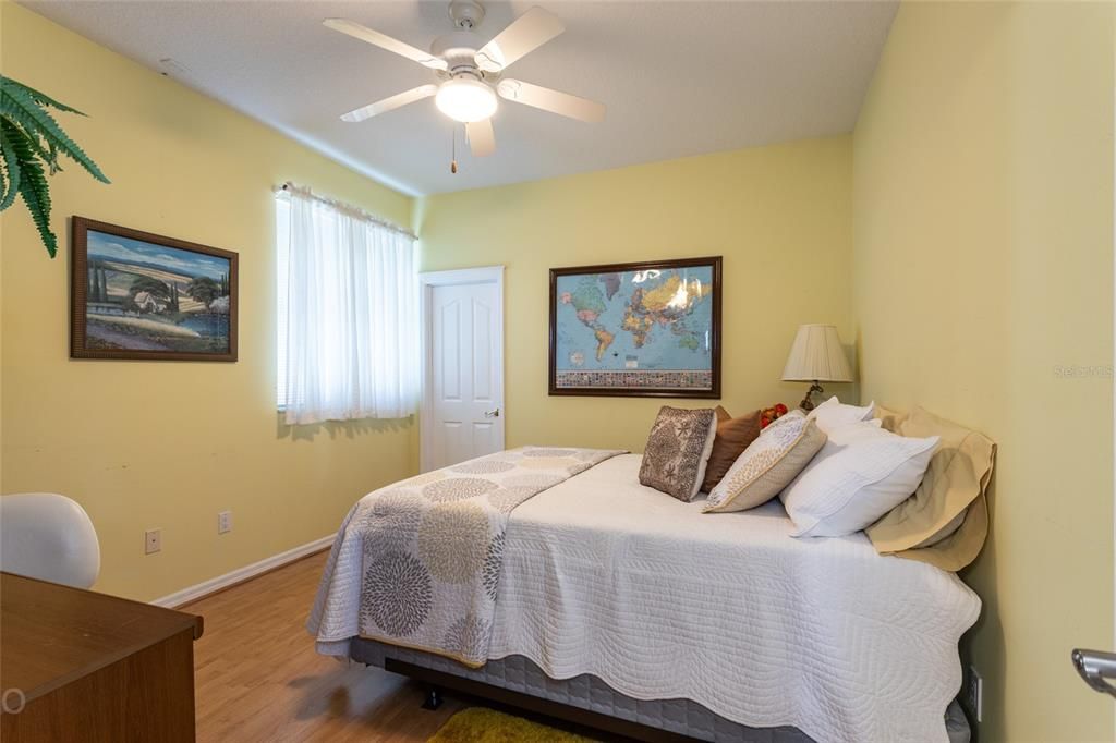 Guest Bedroom With Walk-In Closet