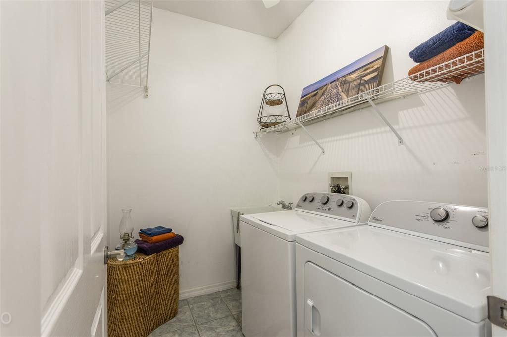 Laundry with Sink. Washer/Dryer Convey