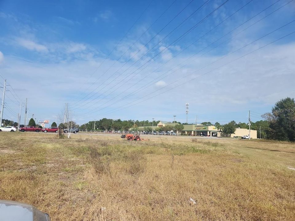 PLAZA IN THE BACK GROUND WEST OF PINE RD