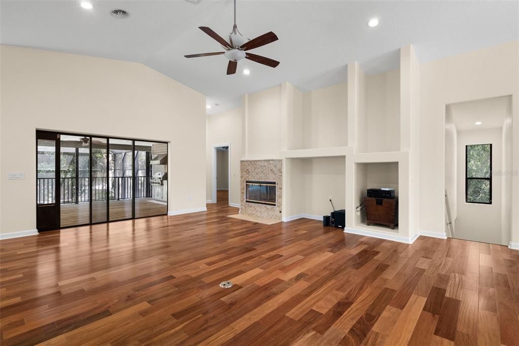 Living Room - stairs to first floor - Sliding door to deck and outdoor living space