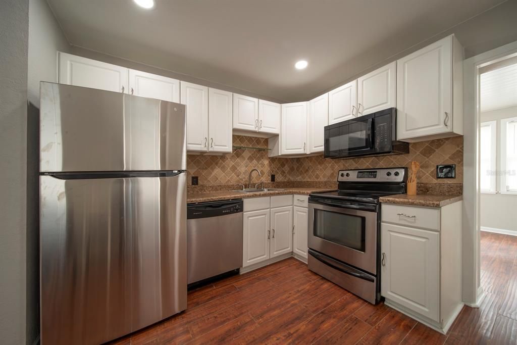 Lovely tiled backsplash New refridgerator