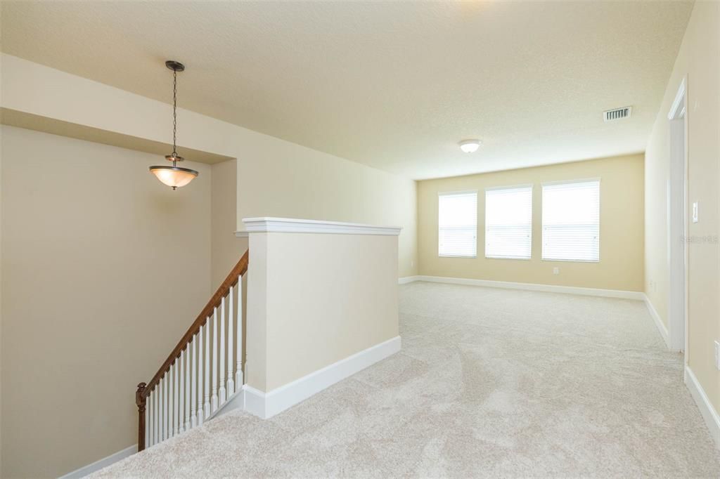 large bonus room/loft upstairs