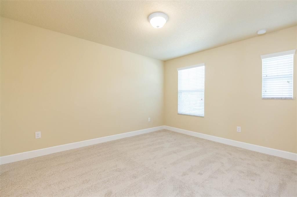 bedroom upstairs with access to jack and jill bath