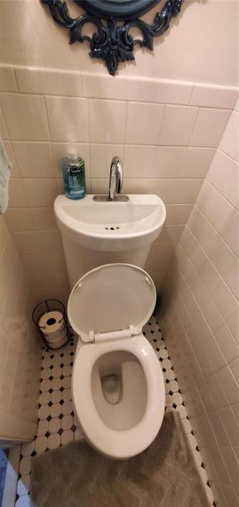 Garage bathroom very unique toilet/wash bowl combo