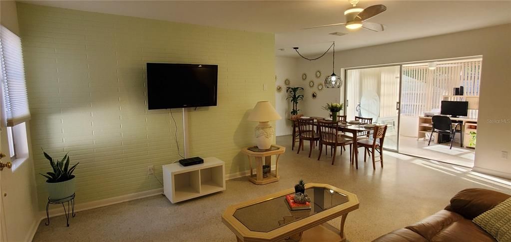 View from front door looking in to living/dining area and sunroom