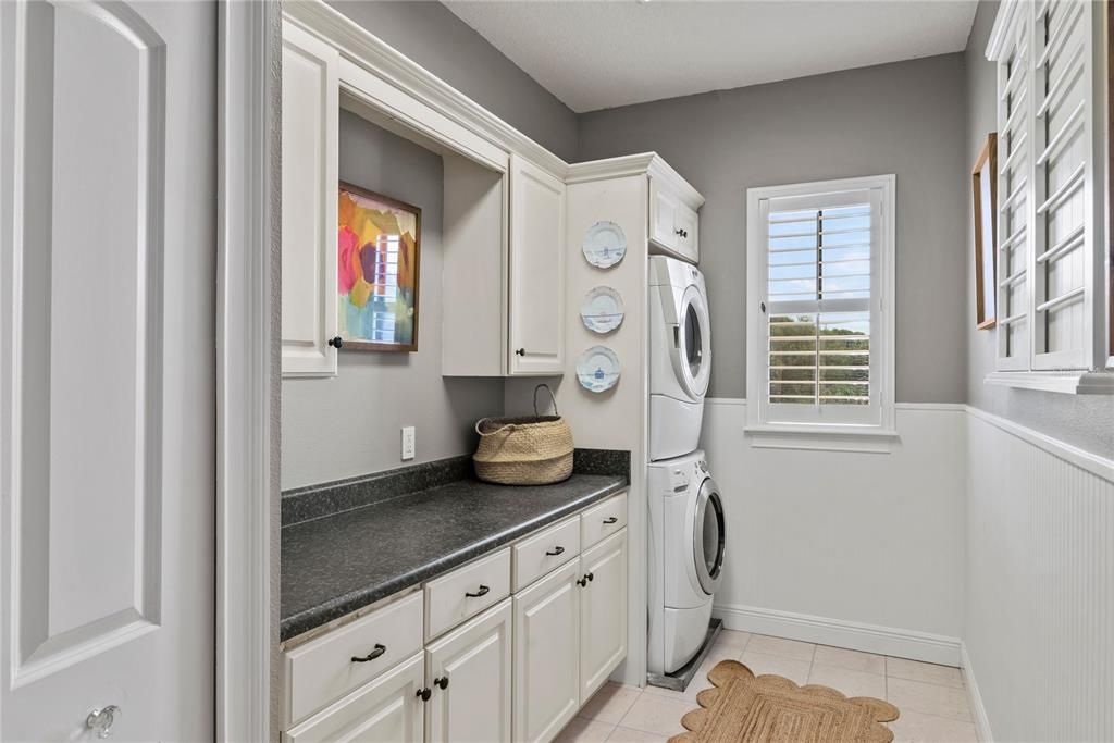 Large laundry room- already plumbed for a sink if you want to add one