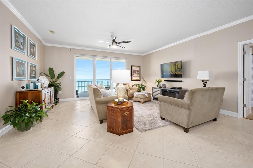 Living room, open concept. Lots of natural light with direct oceanview