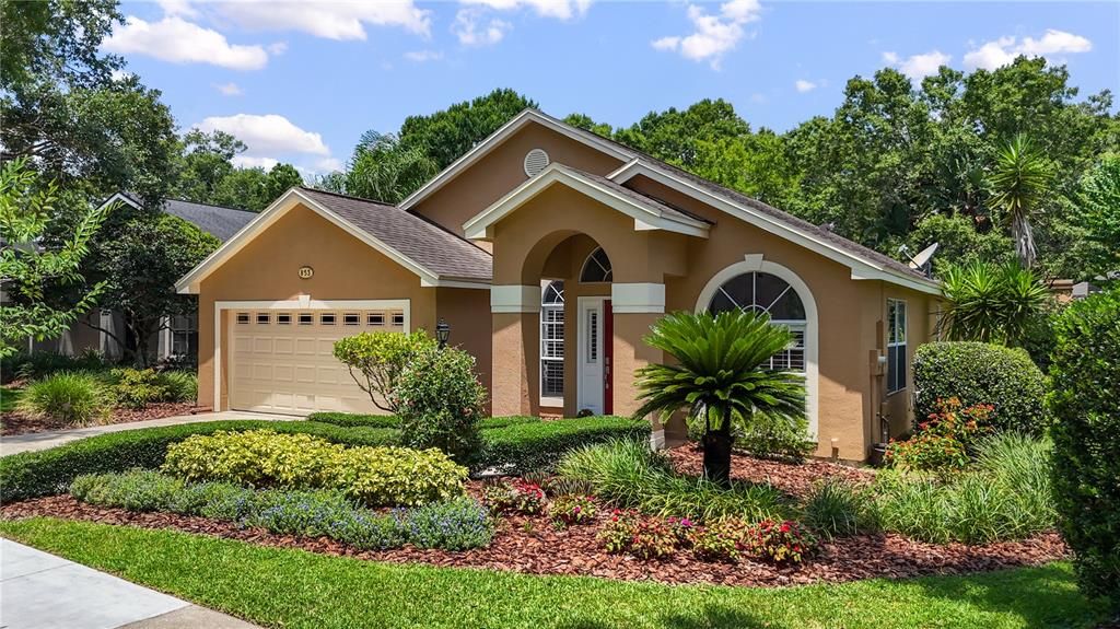 Manicured front lawn gives impressive curb appeal.