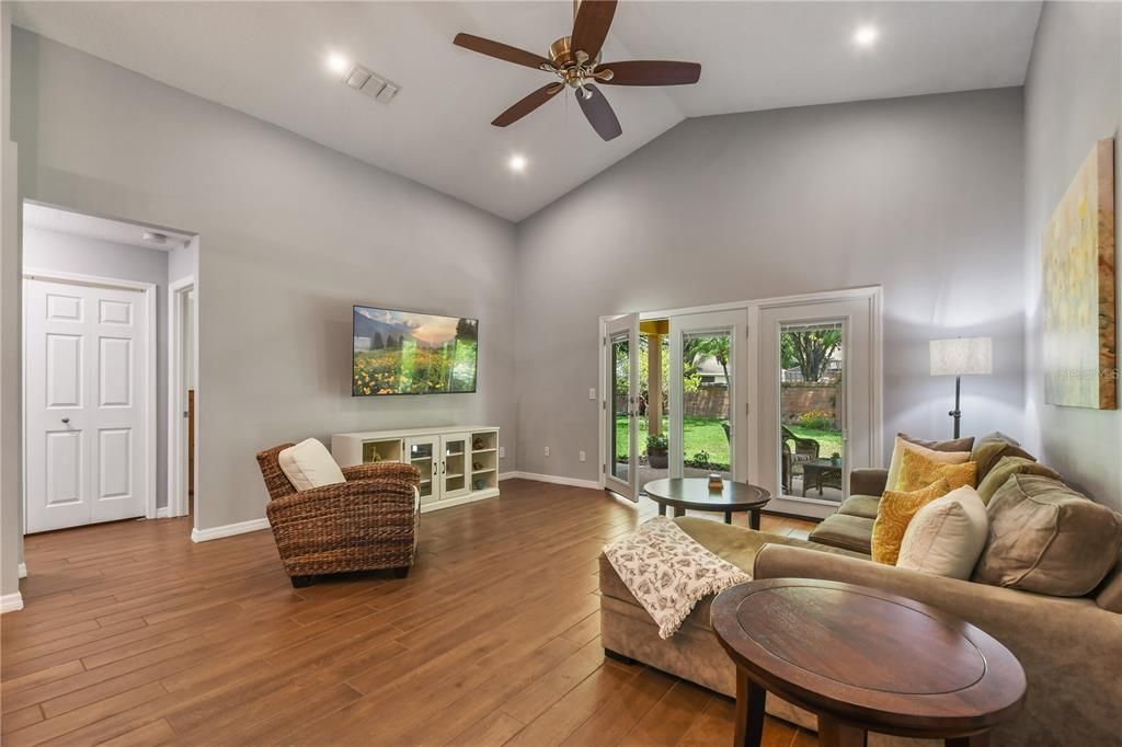 Large family room with new french doors leading to patio.