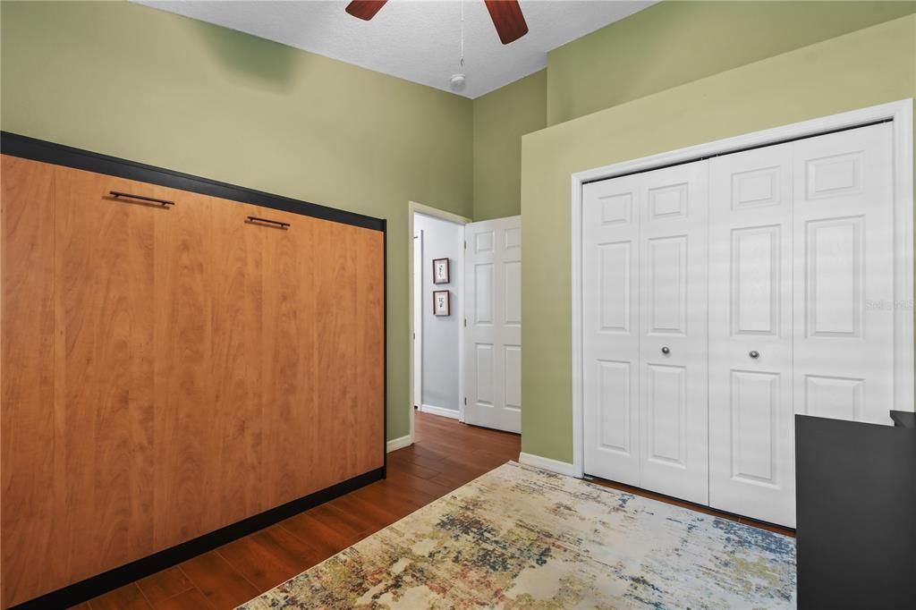 Third bedroom used as office with Murphy bed for guests.