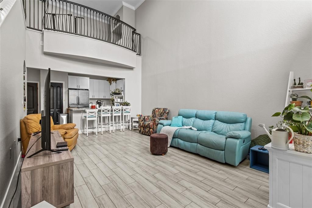 downstairs living area and upstairs loft